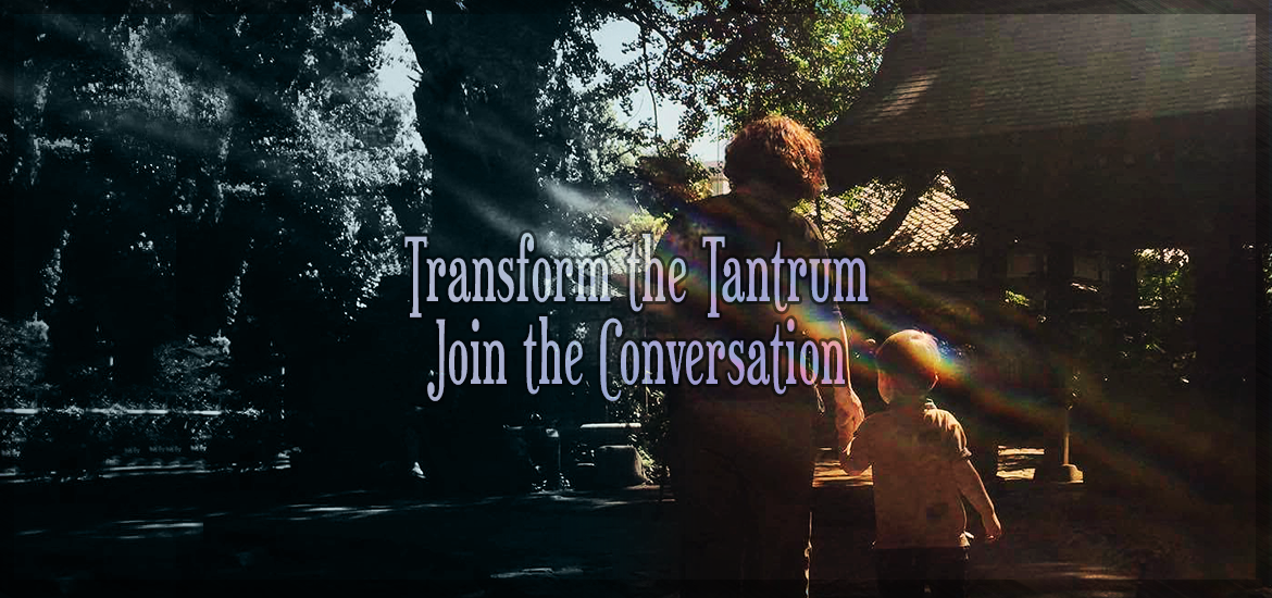 Transform Tantrums Join the conversation. Image: A mother and child walk hand-in-hand through a garden shrine. Sunlight streams down upon them.